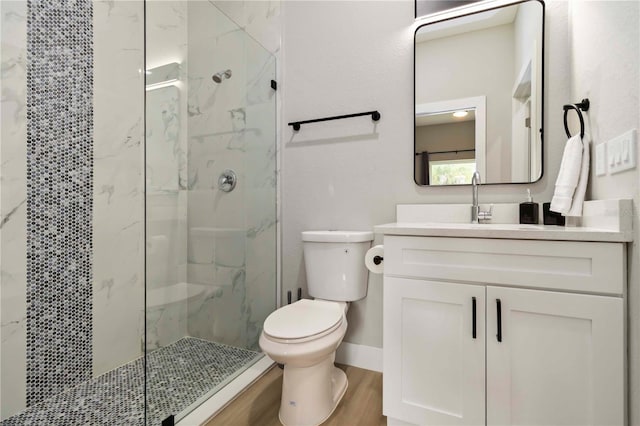 9417 Agate St, Port Charlotte, FL 33981 - full bathroom with toilet, a marble finish shower, vanity, and wood finished floors