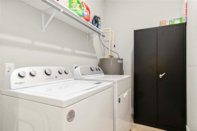 9417 Agate St, Port Charlotte, FL 33981 - laundry area featuring water heater and independent washer and dryer