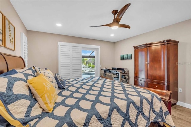 1461 Marlin St, Nokomis, FL 34275 - bedroom with access to exterior, wood finished floors, ceiling fan, and recessed lighting