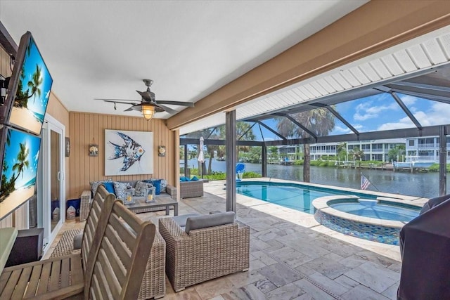 1461 Marlin St, Nokomis, FL 34275 - view of swimming pool featuring an outdoor hangout area, ceiling fan, a water view, a patio, and a pool with connected hot tub