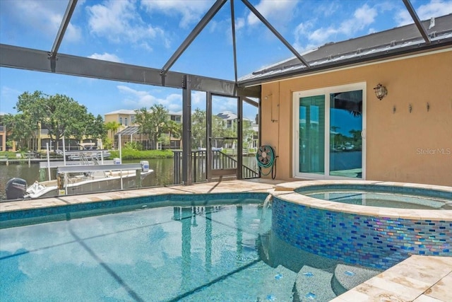 1461 Marlin St, Nokomis, FL 34275 - view of swimming pool featuring a lanai, a pool with connected hot tub, and a water view