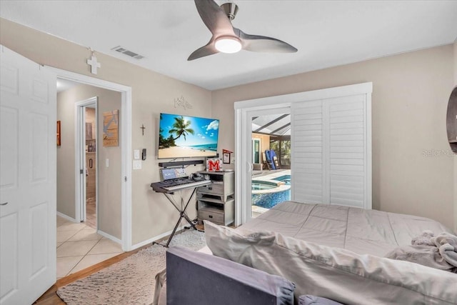 1461 Marlin St, Nokomis, FL 34275 - bedroom with a ceiling fan, access to exterior, and light wood-style floors