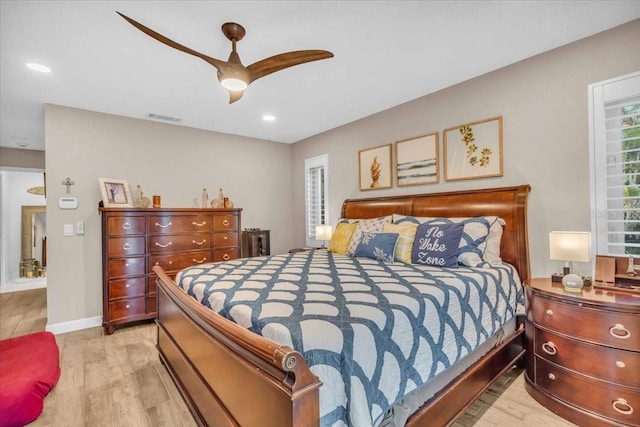 1461 Marlin St, Nokomis, FL 34275 - bedroom with wood finished floors, a ceiling fan, and recessed lighting
