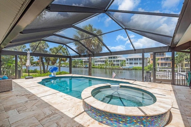 1461 Marlin St, Nokomis, FL 34275 - view of pool with a water view, a patio area, a pool with connected hot tub, and a lanai