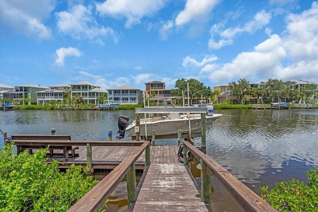 1461 Marlin St, Nokomis, FL 34275 - dock featuring boat lift, a water view, and a residential view