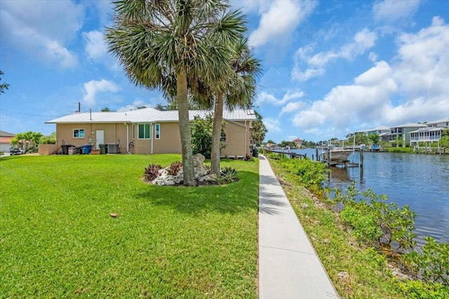 1461 Marlin St, Nokomis, FL 34275 - dock area with a yard and a water view