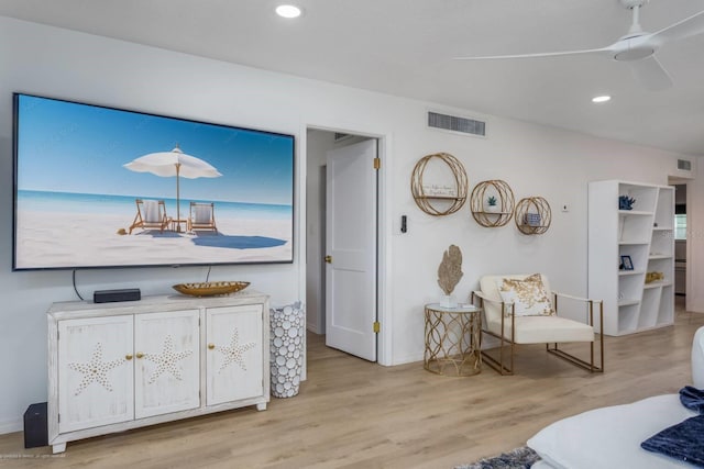 5600 Beach Way Dr Unit 315, Sarasota, FL 34242 - living room with wood finished floors, recessed lighting, ceiling fan, and baseboards