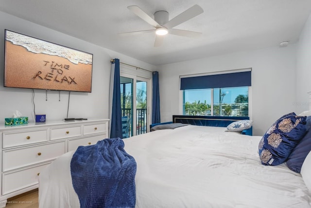 5600 Beach Way Dr Unit 315, Sarasota, FL 34242 - bedroom featuring access to outside and a ceiling fan