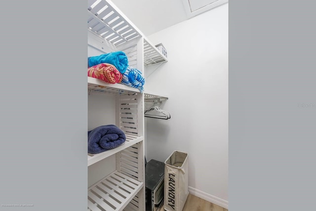 5600 Beach Way Dr Unit 315, Sarasota, FL 34242 - spacious closet with wood finished floors