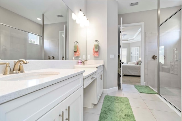 4540 Terrazza Ct, Bradenton, FL 34211 - bathroom featuring double vanity, a stall shower, tile patterned floors, and ensuite bathroom