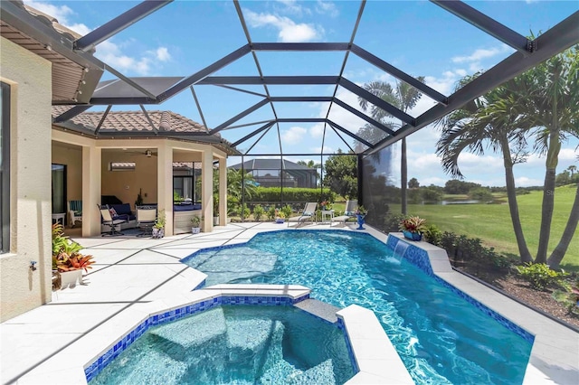 4540 Terrazza Ct, Bradenton, FL 34211 - view of swimming pool with a patio, a pool with connected hot tub, a yard, an outdoor hangout area, and a lanai