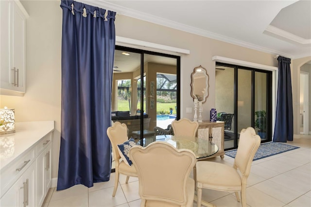 4540 Terrazza Ct, Bradenton, FL 34211 - dining space featuring light tile patterned floors and crown molding
