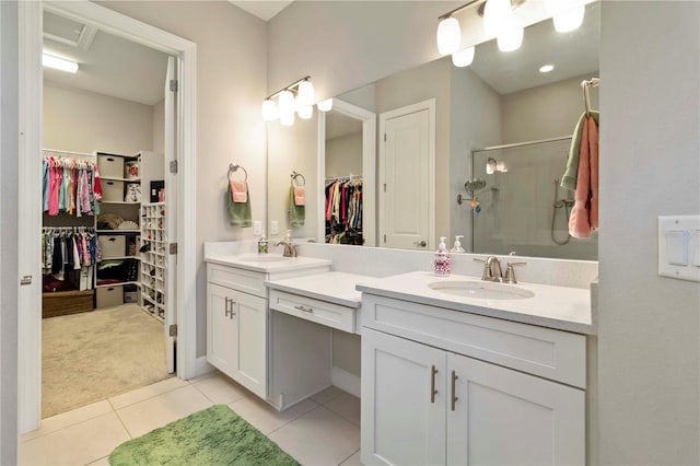 4540 Terrazza Ct, Bradenton, FL 34211 - full bath with a walk in closet, double vanity, a shower stall, and tile patterned floors