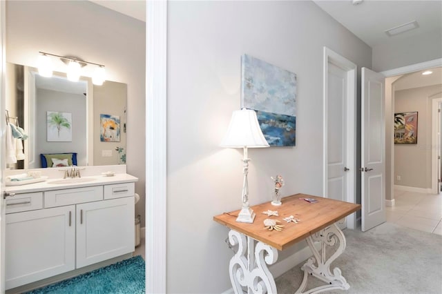 4540 Terrazza Ct, Bradenton, FL 34211 - hallway with light colored carpet and light tile patterned floors