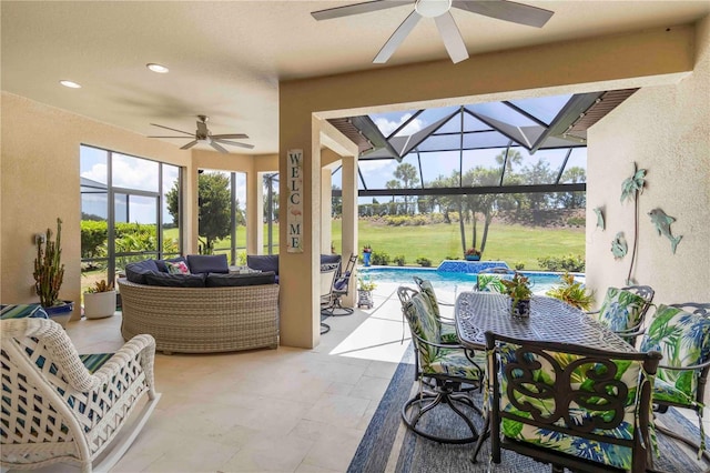 4540 Terrazza Ct, Bradenton, FL 34211 - view of patio / terrace featuring a ceiling fan, an outdoor hangout area, outdoor dining area, and an outdoor pool