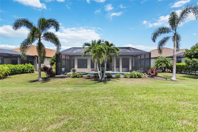 4540 Terrazza Ct, Bradenton, FL 34211 - rear view of property with a lawn and a lanai
