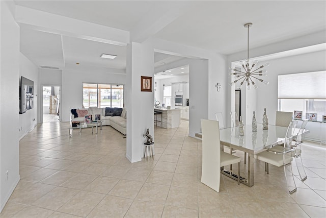 3671 Summerwind Cir, Bradenton, FL 34209 - dining space with a chandelier, light tile patterned flooring, and baseboards