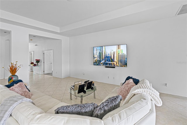 3671 Summerwind Cir, Bradenton, FL 34209 - living room featuring tile patterned floors and baseboards