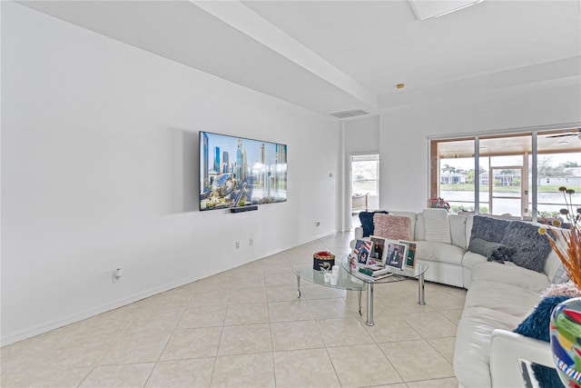 3671 Summerwind Cir, Bradenton, FL 34209 - living area with light tile patterned floors and baseboards
