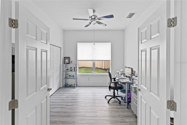 3671 Summerwind Cir, Bradenton, FL 34209 - office area featuring ceiling fan, wood finished floors, and baseboards