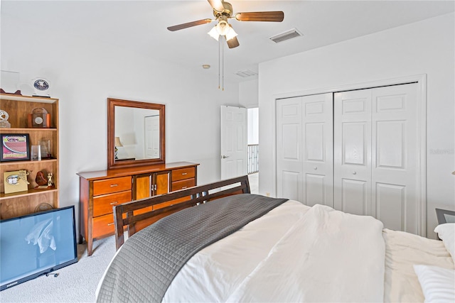 3671 Summerwind Cir, Bradenton, FL 34209 - carpeted bedroom featuring a closet and ceiling fan