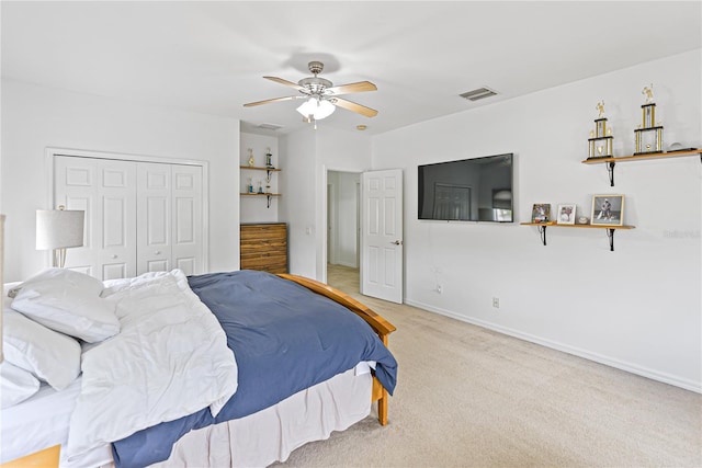 3671 Summerwind Cir, Bradenton, FL 34209 - bedroom featuring carpet flooring, baseboards, a closet, and ceiling fan