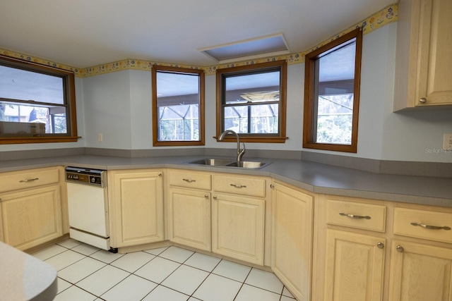 3804 65th St E, Bradenton, FL 34208 - kitchen featuring white dishwasher, light tile patterned floors, and light brown cabinetry