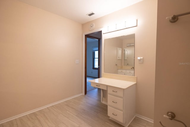 3804 65th St E, Bradenton, FL 34208 - bathroom with baseboards and vanity