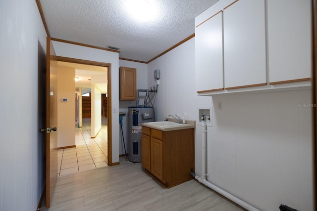 3804 65th St E, Bradenton, FL 34208 - laundry room with electric water heater, crown molding, hookup for a washing machine, and a textured ceiling