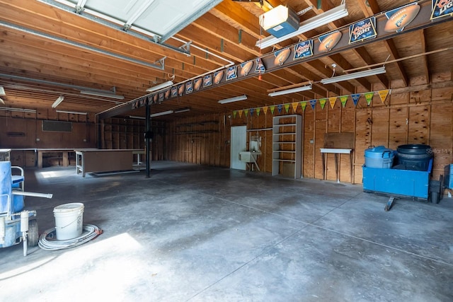 3804 65th St E, Bradenton, FL 34208 - garage featuring a garage door opener