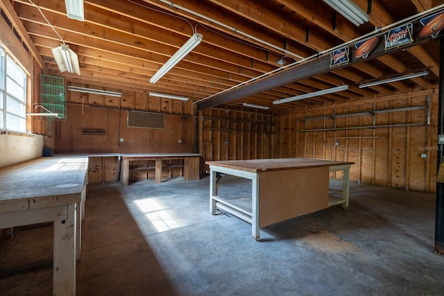 3804 65th St E, Bradenton, FL 34208 - misc room with a workshop area and unfinished concrete floors