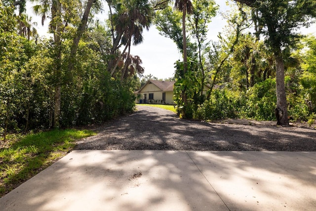 3804 65th St E, Bradenton, FL 34208 - obstructed view of property with a patio