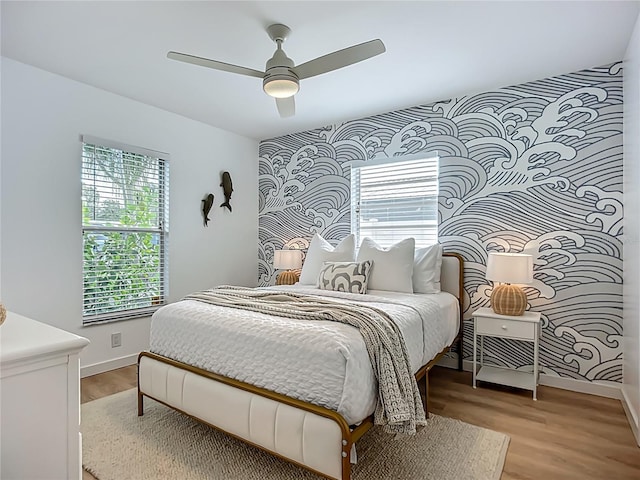 912 Ponderosa Pine Ln, Sarasota, FL 34243 - bedroom featuring light wood finished floors and ceiling fan