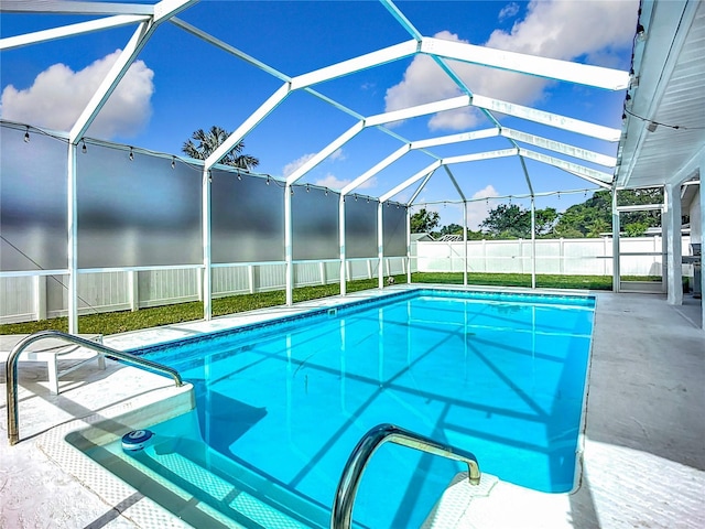912 Ponderosa Pine Ln, Sarasota, FL 34243 - view of swimming pool featuring a fenced backyard, a patio, and glass enclosure