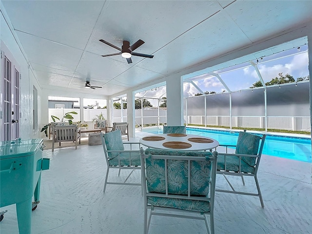 912 Ponderosa Pine Ln, Sarasota, FL 34243 - sunroom / solarium with ceiling fan and a swimming pool
