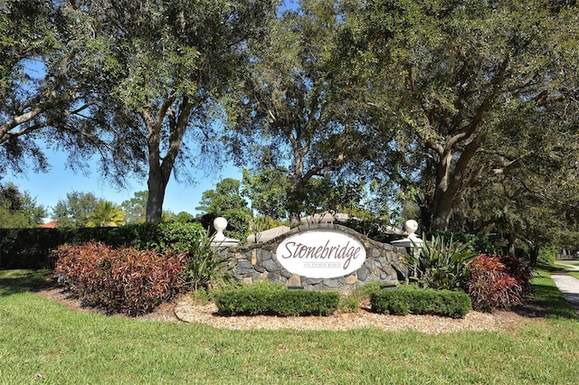 7464 Ridge Rd, Sarasota, FL 34238 - community / neighborhood sign featuring a lawn