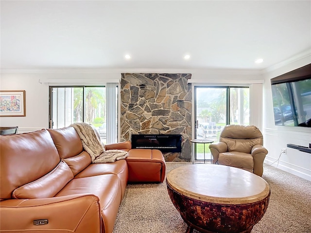 2220 Bahia Vista St Unit G4, Sarasota, FL 34239 - carpeted living area featuring crown molding, healthy amount of natural light, a fireplace, and recessed lighting