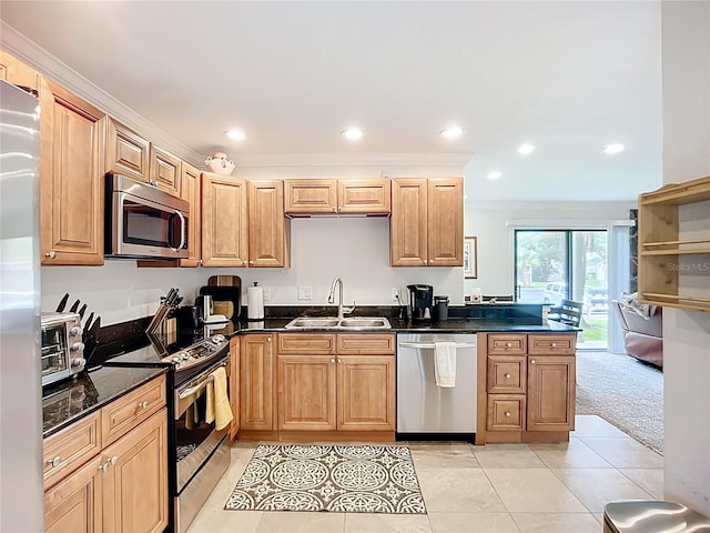 2220 Bahia Vista St Unit G4, Sarasota, FL 34239 - kitchen with appliances with stainless steel finishes, recessed lighting, light tile patterned flooring, light carpet, and dark stone counters
