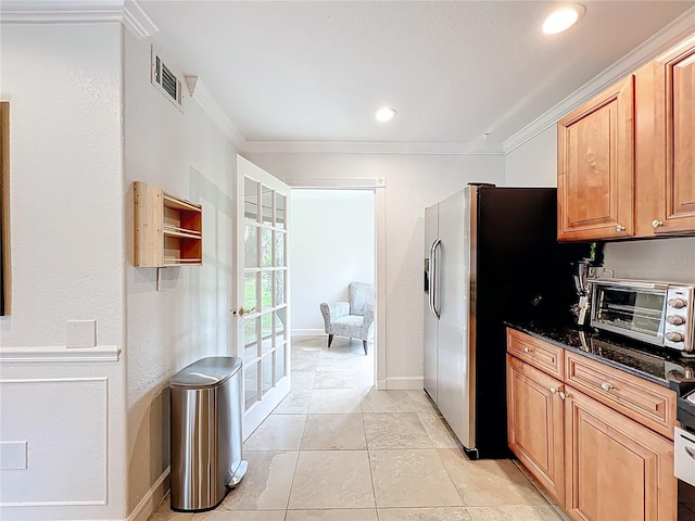 2220 Bahia Vista St Unit G4, Sarasota, FL 34239 - kitchen with ornamental molding, stainless steel fridge with ice dispenser, dark stone counters, stove, and brown cabinets