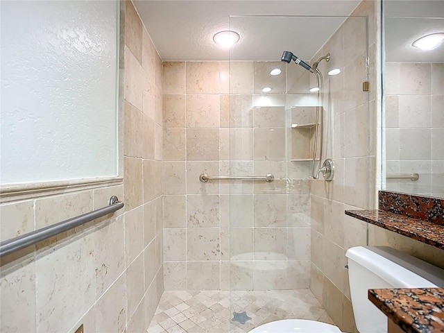 2220 Bahia Vista St Unit G4, Sarasota, FL 34239 - full bathroom with a tile shower and tile walls