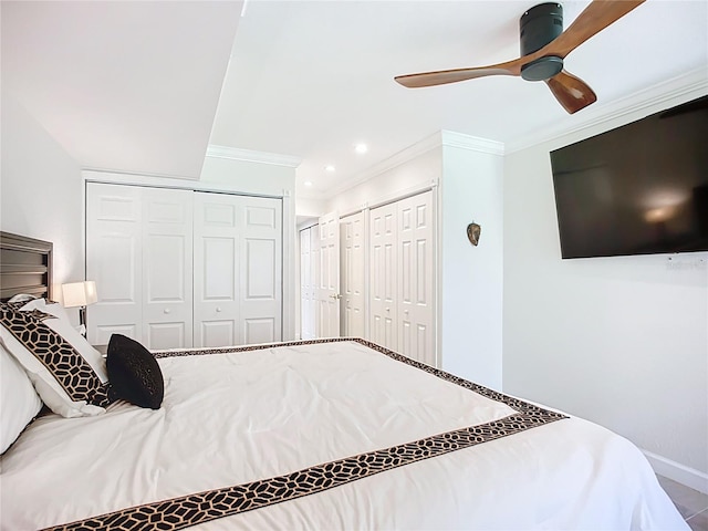 2220 Bahia Vista St Unit G4, Sarasota, FL 34239 - bedroom with ornamental molding, multiple closets, recessed lighting, and ceiling fan