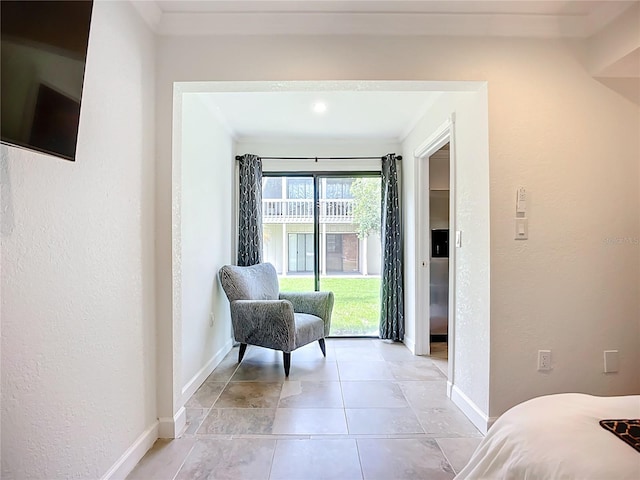 2220 Bahia Vista St Unit G4, Sarasota, FL 34239 - bedroom with access to outside, a textured wall, and light tile patterned floors