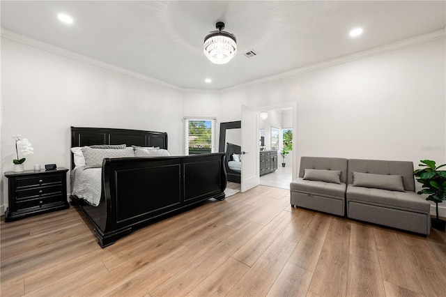 1484 Seafarer Dr, Osprey, FL 34229 - bedroom with a chandelier, light wood-type flooring, ornamental molding, and recessed lighting