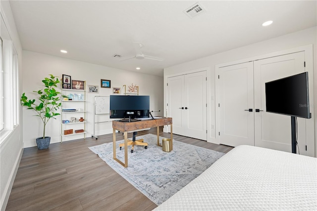 1484 Seafarer Dr, Osprey, FL 34229 - home office featuring wood finished floors, ceiling fan, and recessed lighting