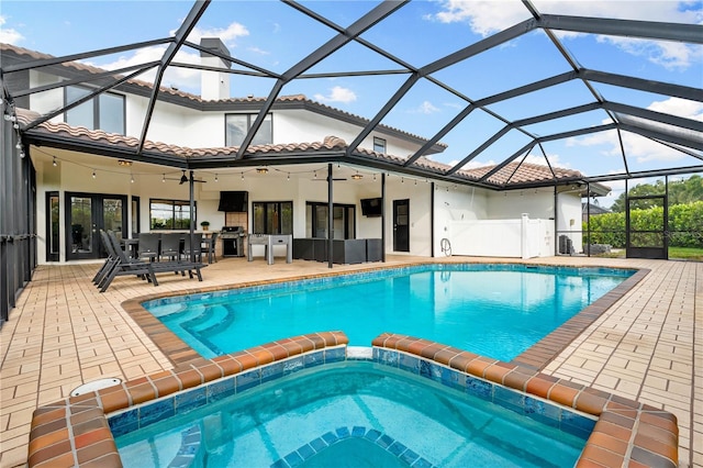 1484 Seafarer Dr, Osprey, FL 34229 - view of pool featuring french doors, ceiling fan, a patio, a pool with connected hot tub, and a grill