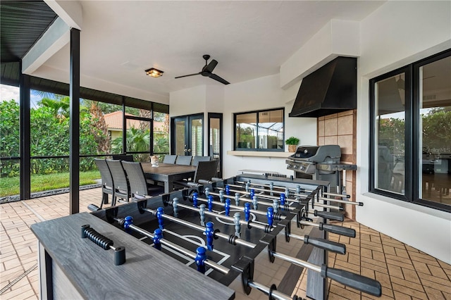 1484 Seafarer Dr, Osprey, FL 34229 - view of patio with outdoor dining space, an outdoor kitchen, and a ceiling fan