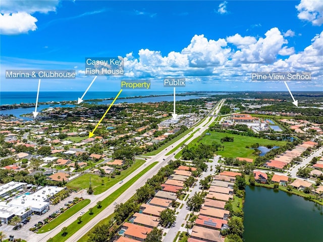 1484 Seafarer Dr, Osprey, FL 34229 - aerial perspective of suburban area with a large body of water