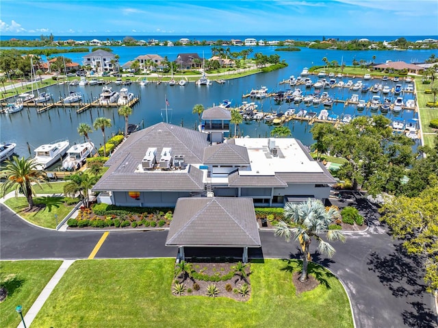 1484 Seafarer Dr, Osprey, FL 34229 - aerial view of property and surrounding area featuring numerous boat docks and a nearby body of water