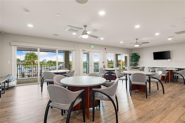 1484 Seafarer Dr, Osprey, FL 34229 - dining room with healthy amount of natural light, recessed lighting, light wood-style flooring, and ceiling fan