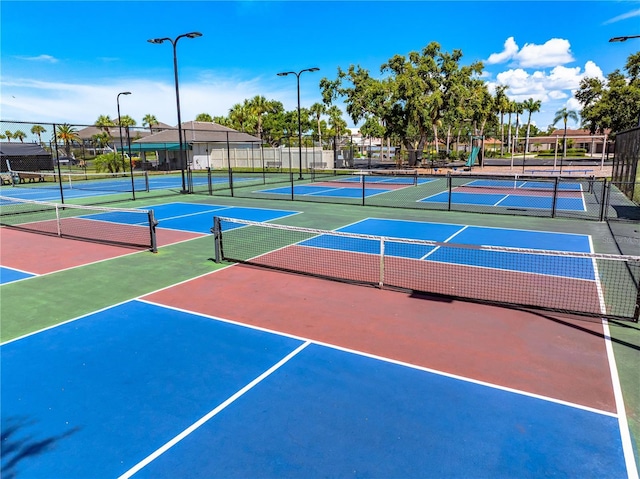 1484 Seafarer Dr, Osprey, FL 34229 - view of tennis court with community basketball court